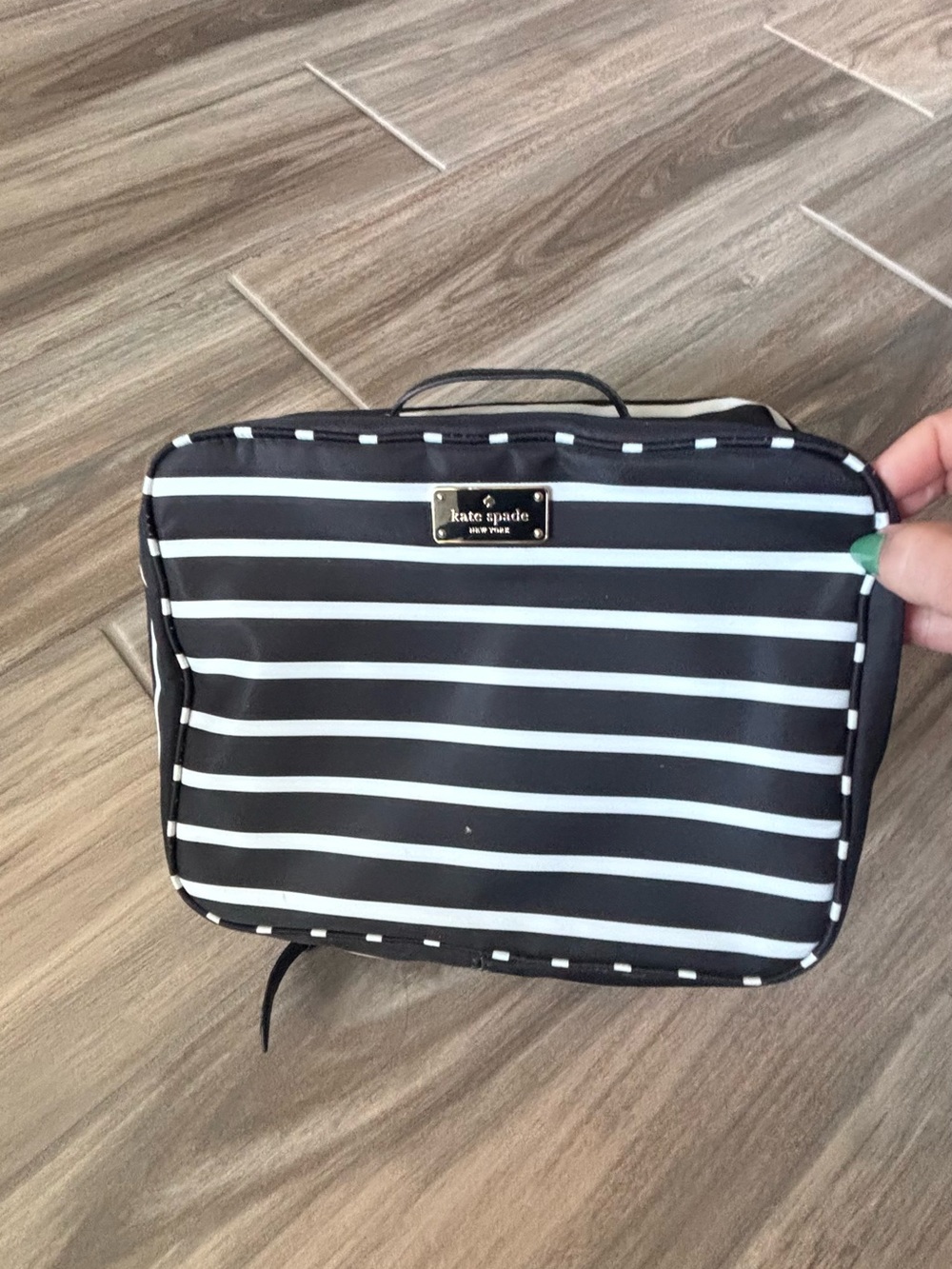 kate spade black and white striped cosmetic pouch with gold logo
